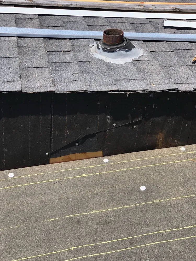 Slide of Kennedy Roofing