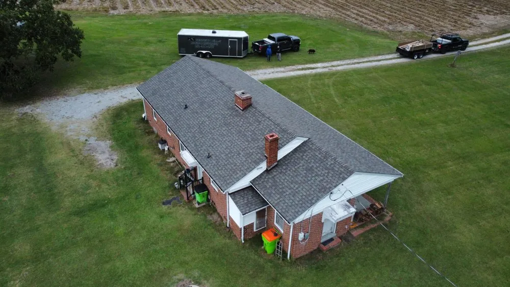 Slide of Kenneth Mills Roofing