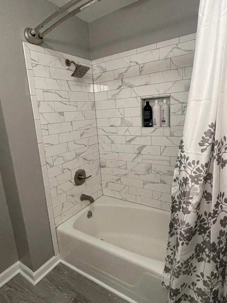 Slide of Kenneth Mills Roofing