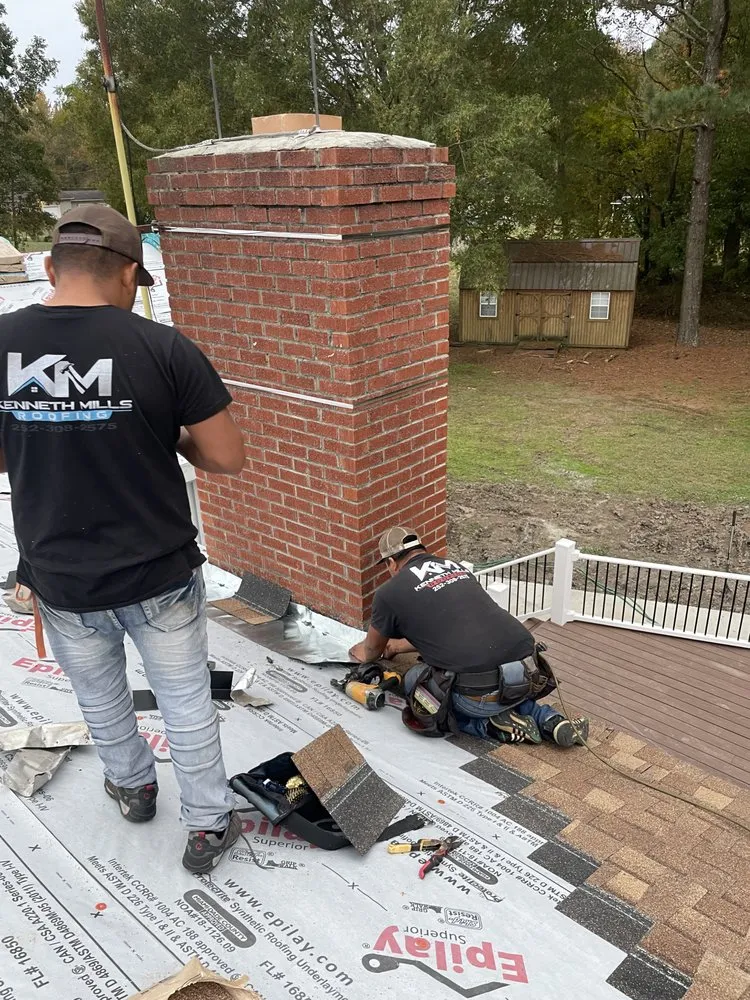 Slide of Kenneth Mills Roofing