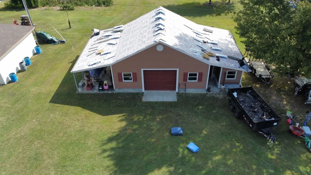 Slide of Kenneth Mills Roofing