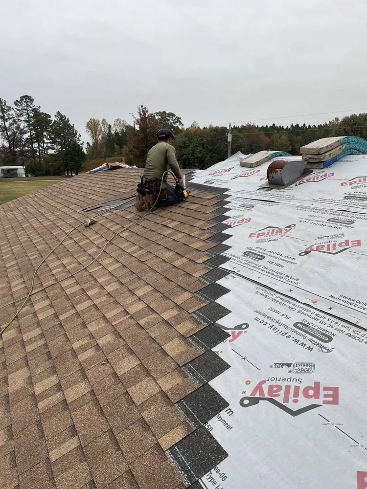 Slide of Kenneth Mills Roofing