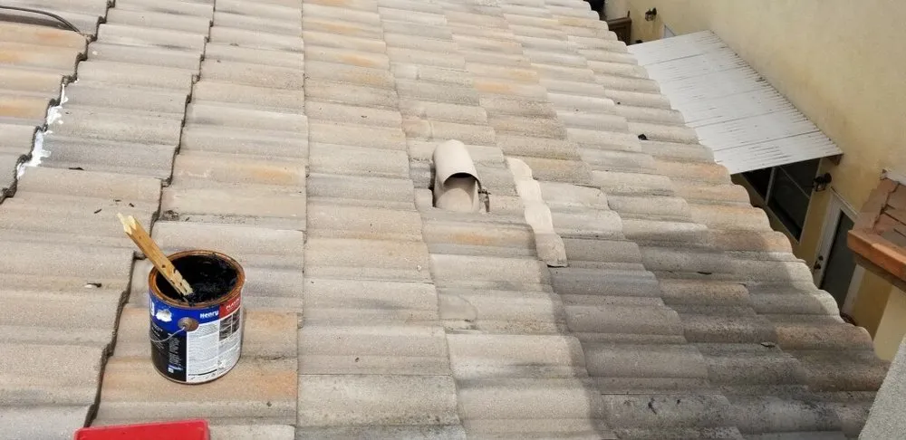 Slide of Kenney Roofing