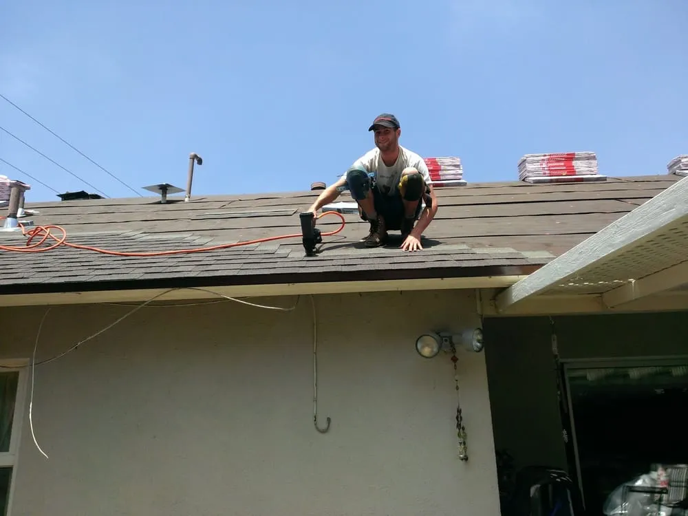 Slide of Kenney Roofing