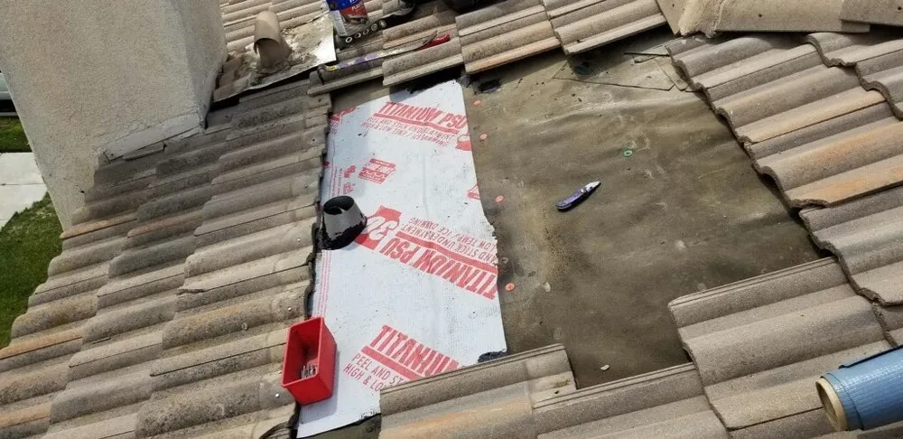 Slide of Kenney Roofing