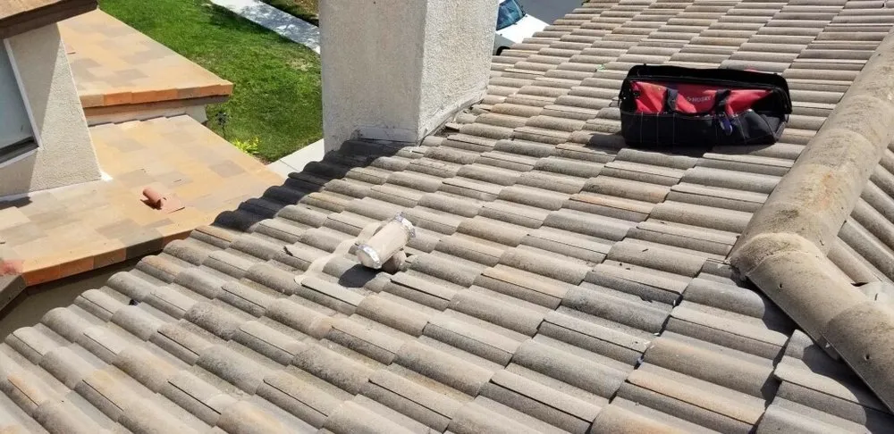 Slide of Kenney Roofing