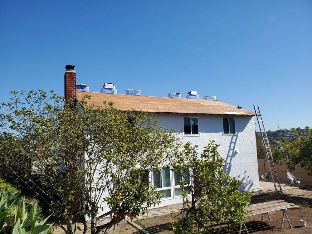 Slide of Kenney Roofing