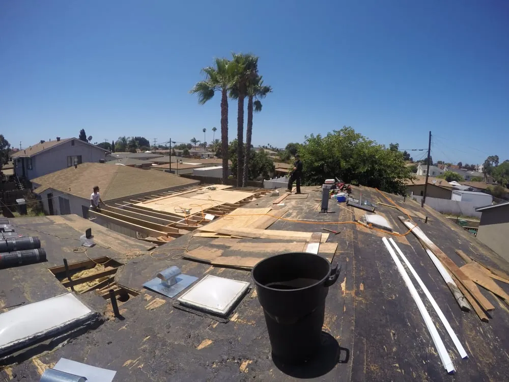 Slide of Kenney Roofing