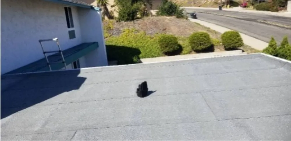 Slide of Kenney Roofing