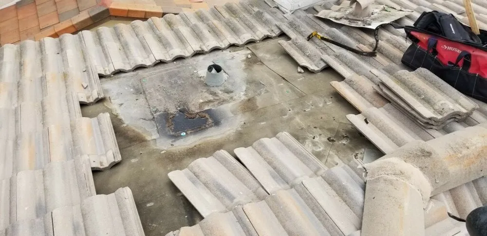 Slide of Kenney Roofing