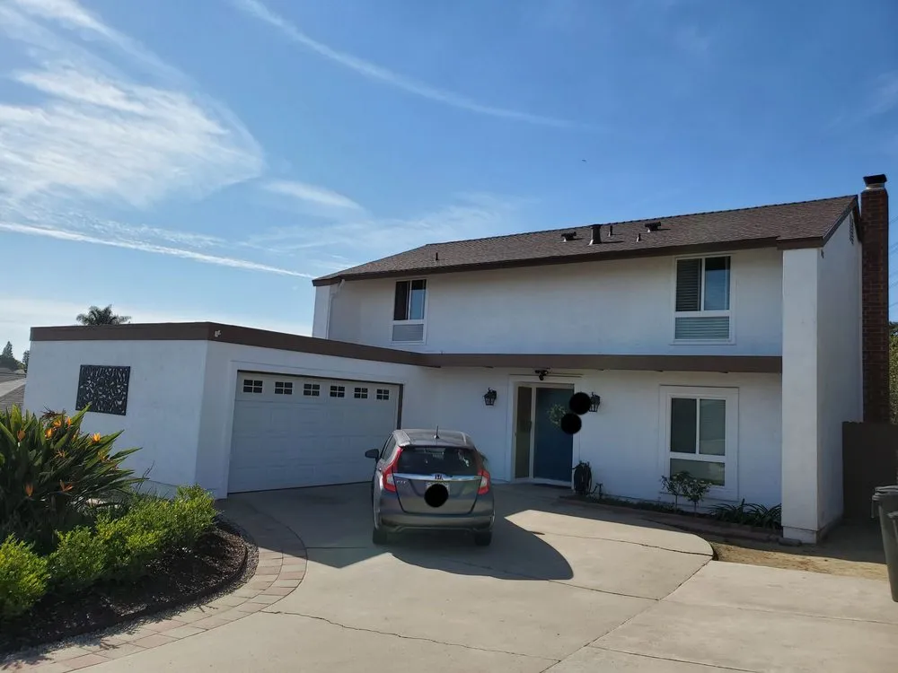 Slide of Kenney Roofing