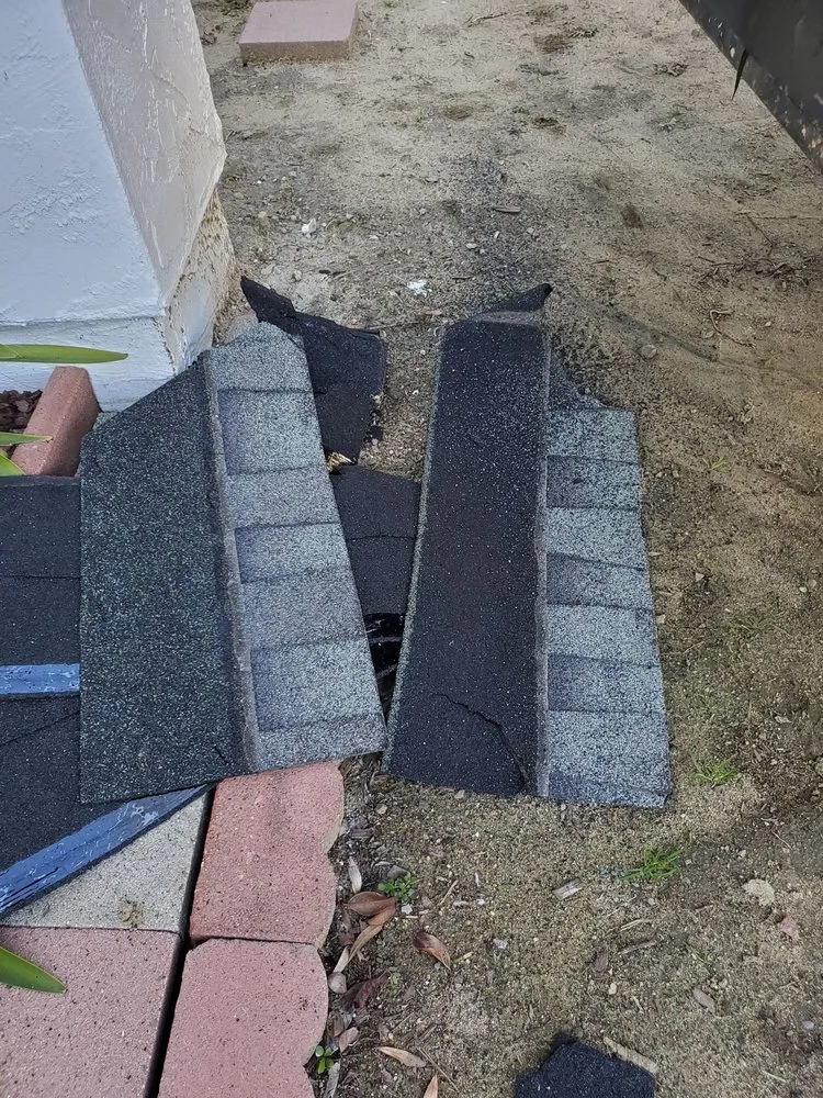 Slide of Kenney Roofing