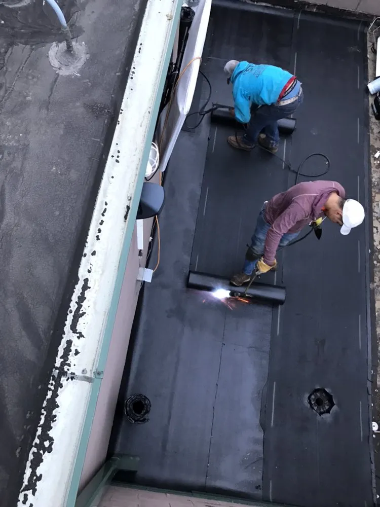 Slide of Kenny Ephraim Roofing