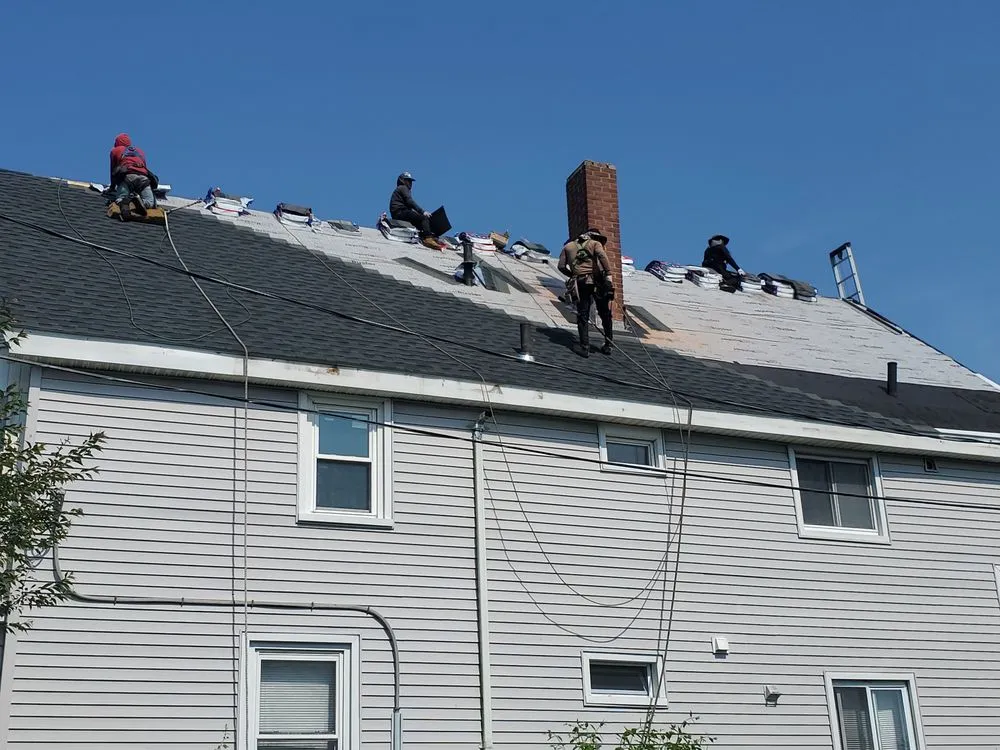 Slide of Kenny Nukes Roofing and Construction