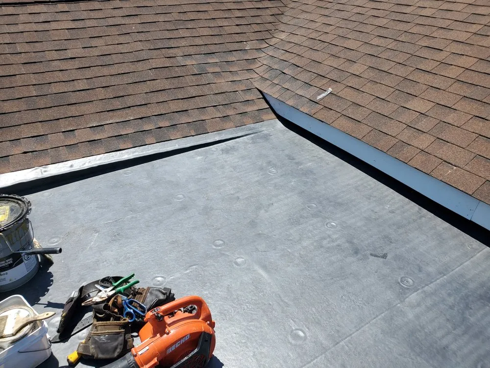 Slide of Kenny Nukes Roofing and Construction