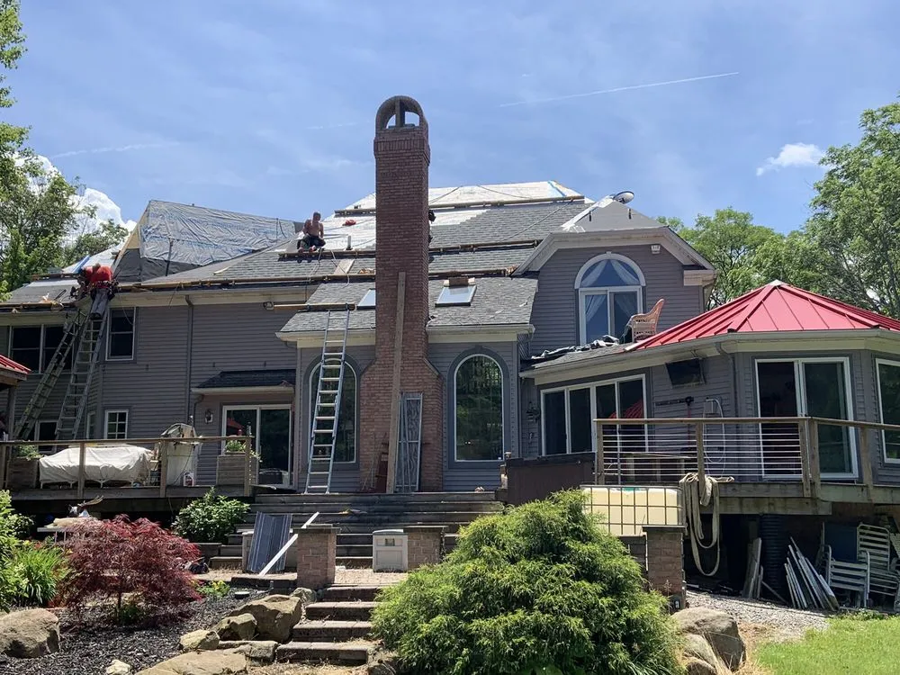 Slide of Ken's Parkhill Roofing