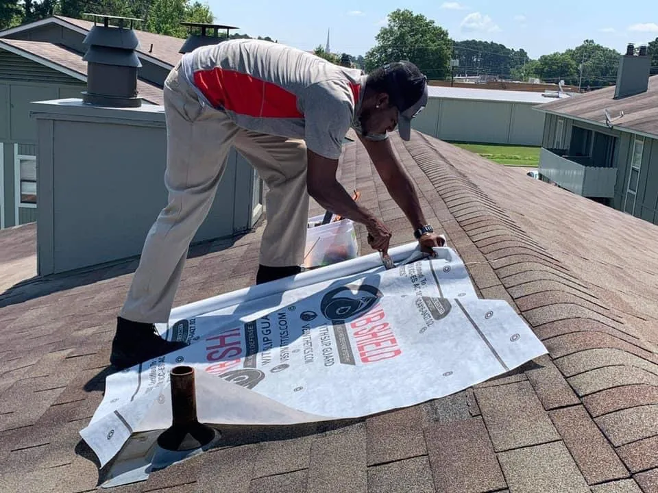 Slide of Ken's Roofing and Construction