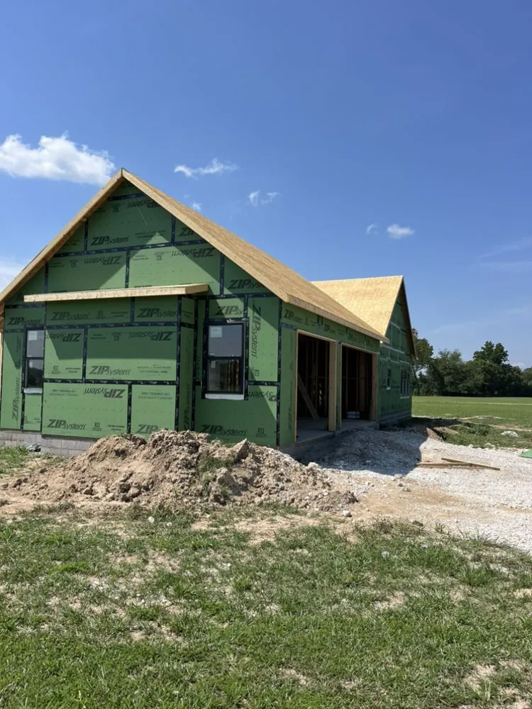 Slide of Ken's Roofing