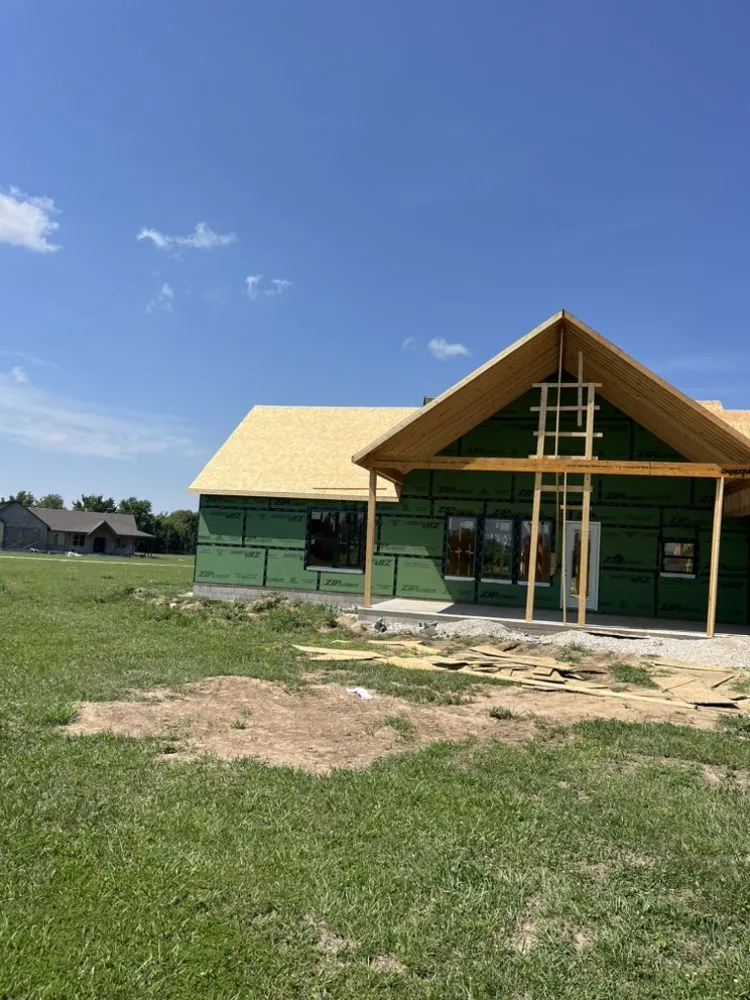 Slide of Ken's Roofing