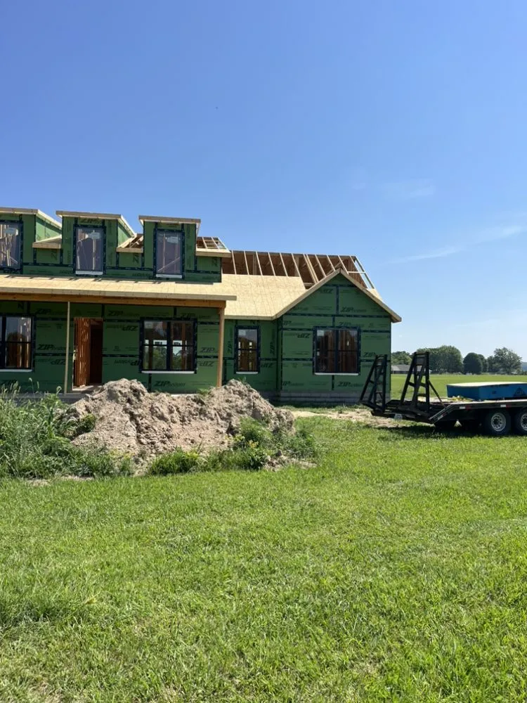 Slide of Ken's Roofing