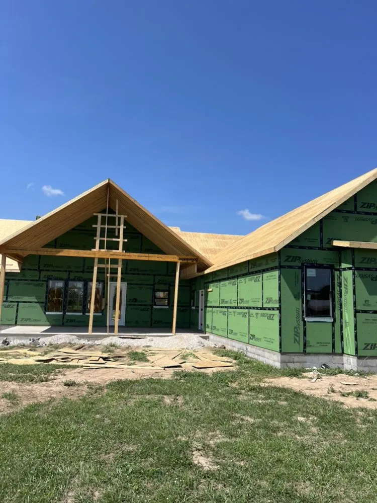 Slide of Ken's Roofing