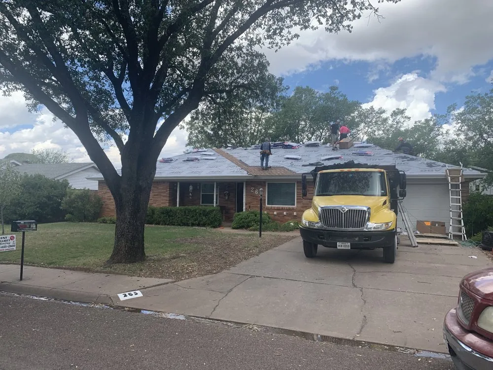 Slide of Kent Elliott Roofing