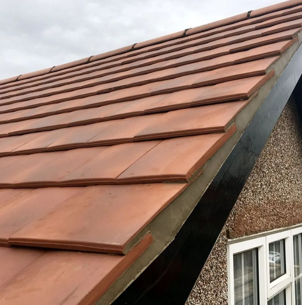 Slide of Kenwood Roofing