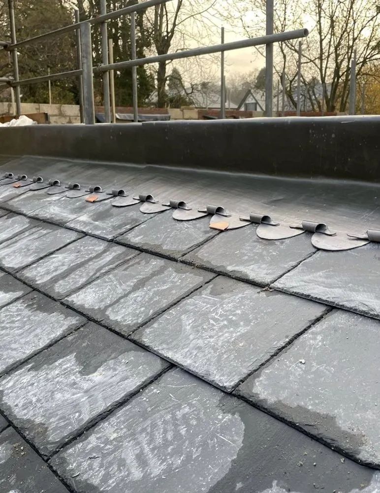 Slide of Kenwood Roofing