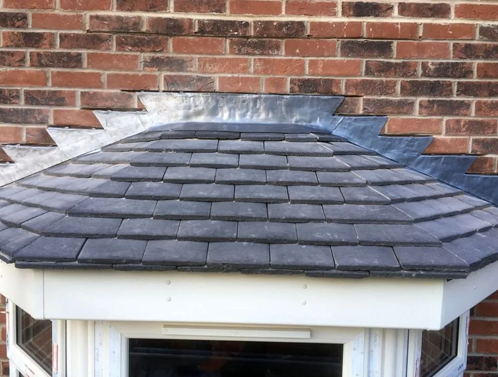 Slide of Kenwood Roofing