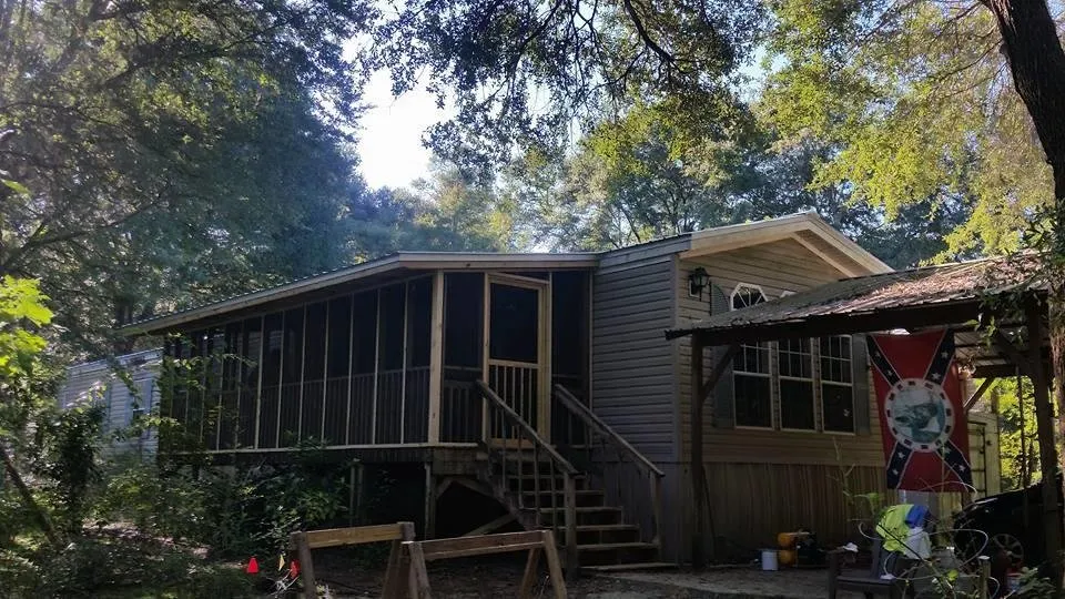 Licensed flat roof repair after storm damage in Ponce De Leon, FL by Kevin Smith Contracting