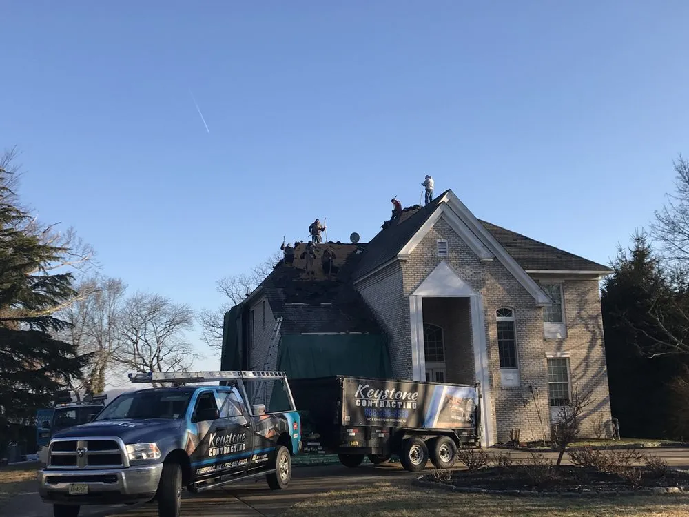 Professional flat roof repair in Howell Township, NJ by Keystone Roofing & Siding