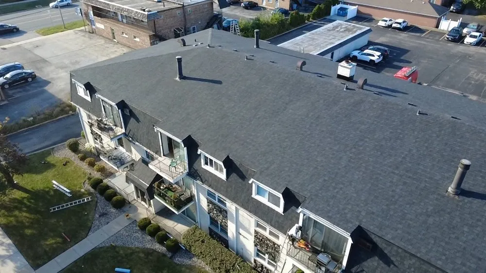 Slide of KG Roofing & Construction