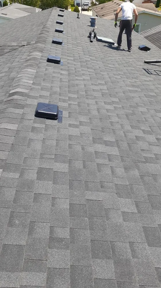 Slide of KG Roofing & Construction