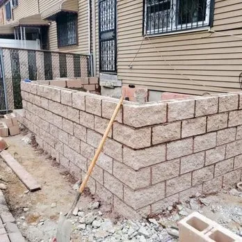 Slide of KG Roofing Masonry