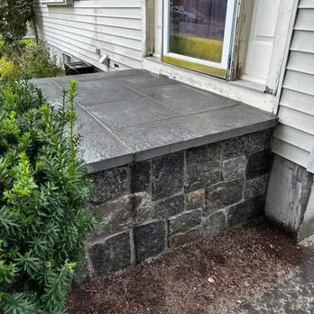 Slide of KG Roofing Masonry