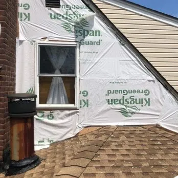 Slide of KG Roofing Masonry