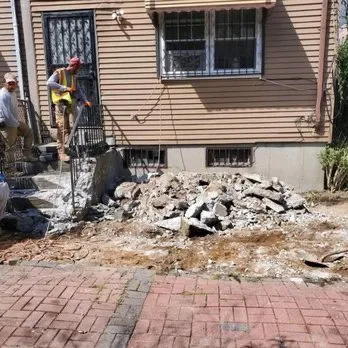 Slide of KG Roofing Masonry