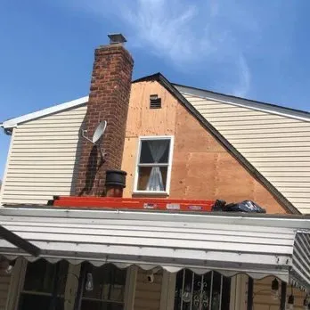 Slide of KG Roofing Masonry