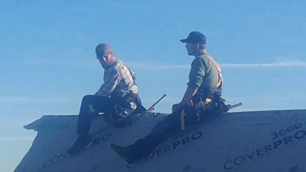 Slide of KGJ Roofing