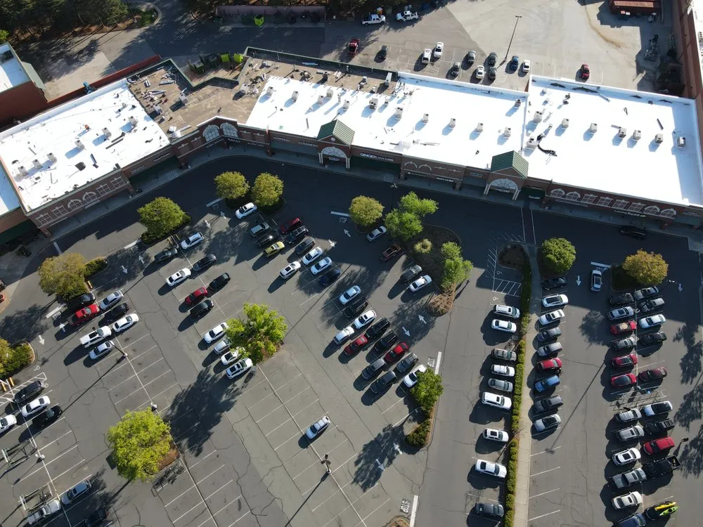 Slide of KH Commercial Roofing