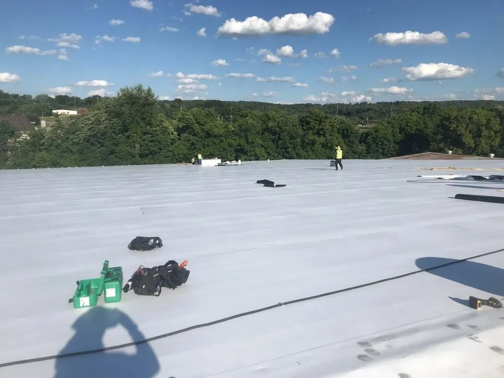 Emergency storm damage roof repair in Tampa Palms, FL by KH Commercial Roofing