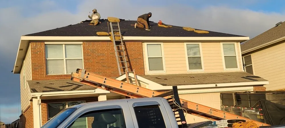 Slide of Kiaas Roofing