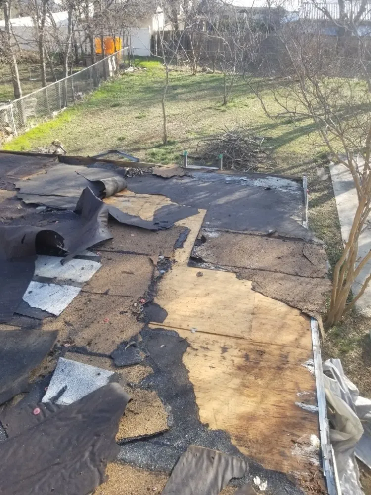 Slide of Kiaas Roofing