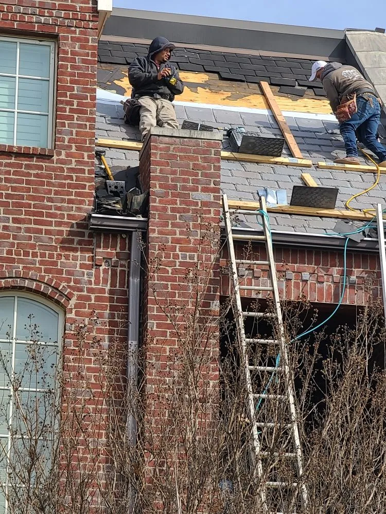 Slide of Kiaas Roofing