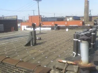 Slide of Kiley Roofing