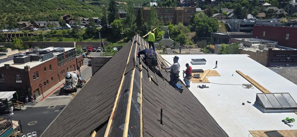 Professional flat roof repair with free inspection across South Salt Lake City, UT - Kimball Roofing & Siding