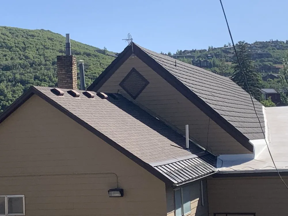 Professional shingle roofing service in South Salt Lake City, UT by Kimball Roofing & Siding