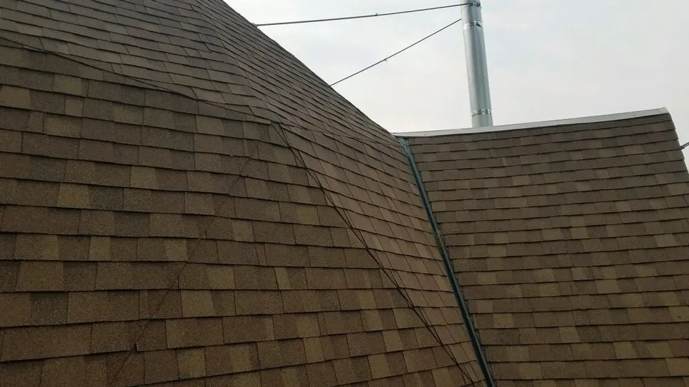 Slide of King Bee Roofing