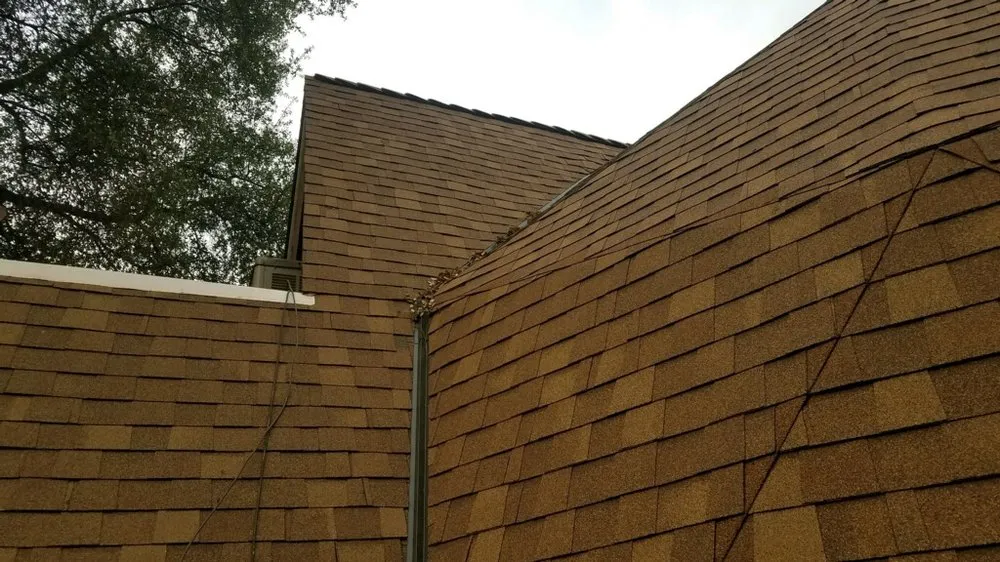 Slide of King Bee Roofing