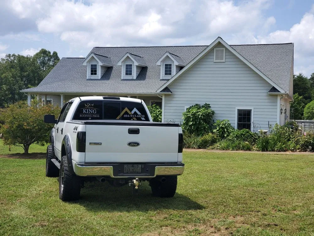 Slide of King Roofing Pros